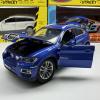 Метална кола с отварящи се врати и капаци BMW X6 1:24