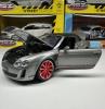 Метална кола с отварящи се врати и капаци BENTLEY CONTINENTAL SUPERSPORTS ISR 1:24