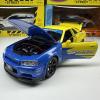Метална кола с отварящи се врати, светлини и звуци Nissan Skyline GT-R 1:24